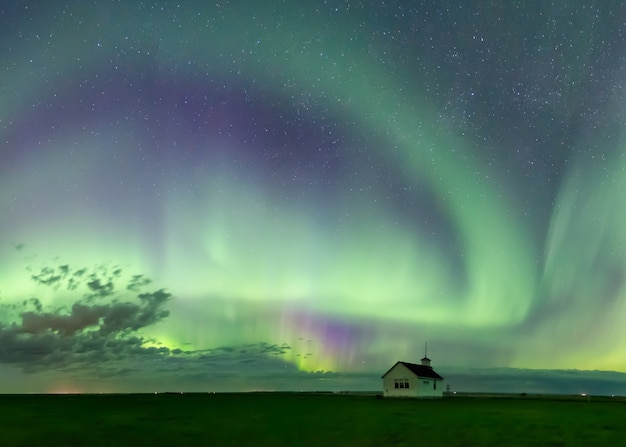 Swirl of Aurora Borealis Northern Lights over the historical North Saskatchewan 