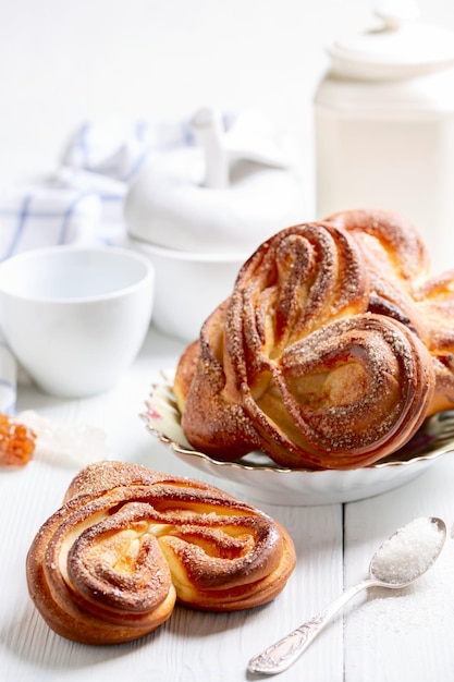 Swirling buns sprinkled with sugar