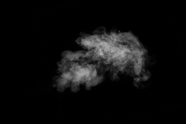 Photo swirling wriggling smoke steam isolated on a black background for overlaying on your photos fragment of horizontal steam