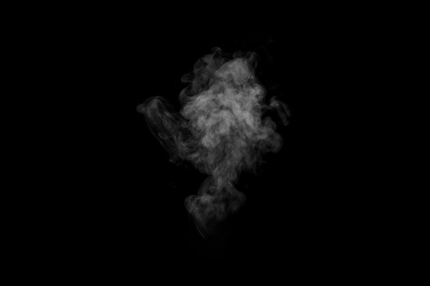 Swirling wriggling smoke steam isolated on a black background for overlaying on your photos Fragment of vertical steam