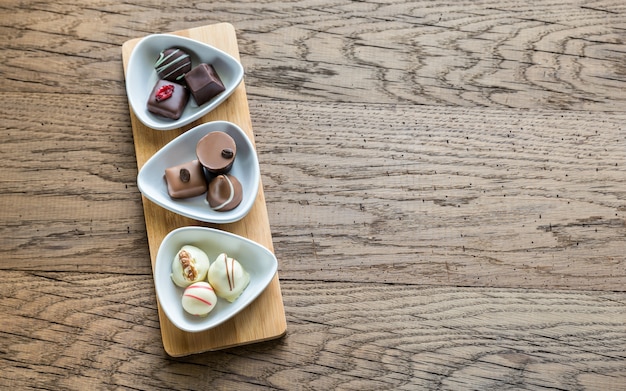 Swiss chocolate candies in white bowl