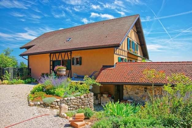 Swiss Village House in Yverdon les Bains of Jura Nord Vaudois district of Canton Vaud, Switzerland.