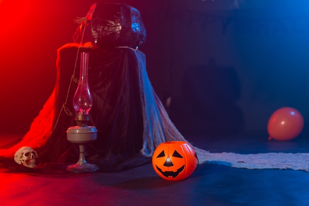 Symbol of halloween jackolantern on a dark background halloween card lamp in decorations background