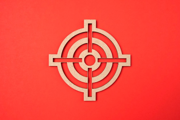 Symbol target paper cut on red background with copy space Business iconic symbol