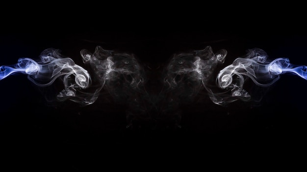 Photo symmetrical purple and white smoke design over black background