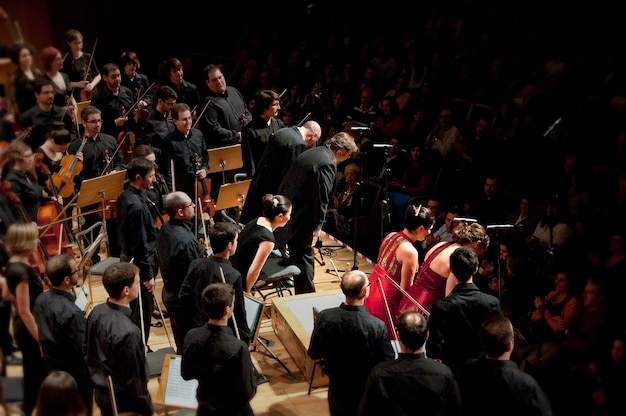 Symphonic orchestra performing on stage