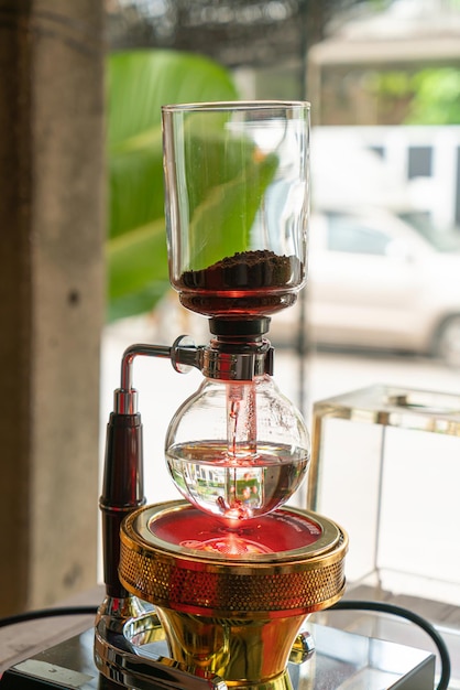 syphon classic coffee maker in local coffee shop