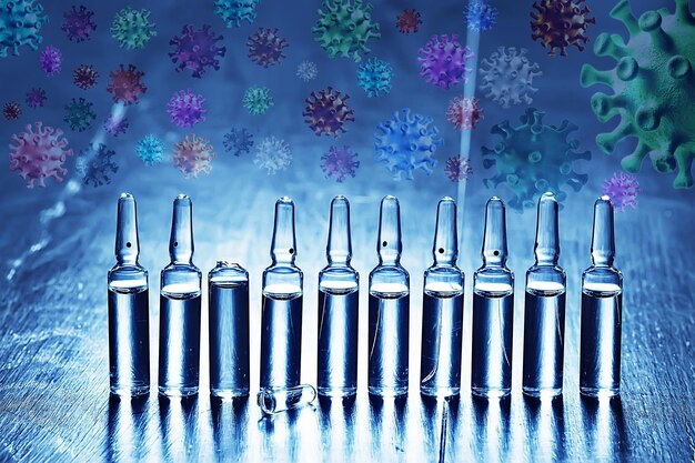 Photo syringe and ampoule, coronavirus vaccine, concept medicine vaccination protection covid 19