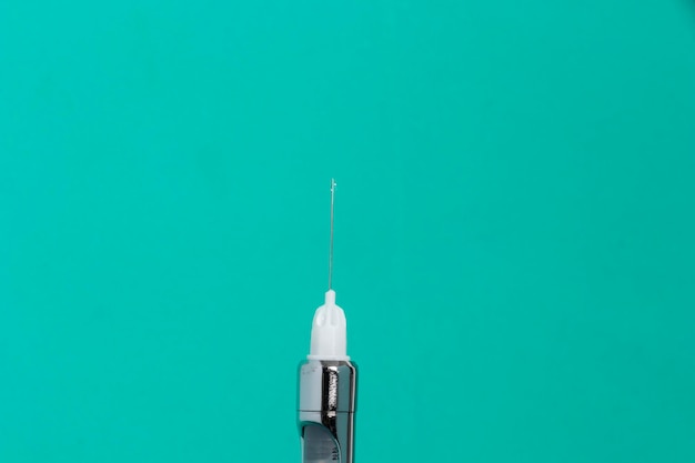 Photo syringe for anesthesia with clinical green background