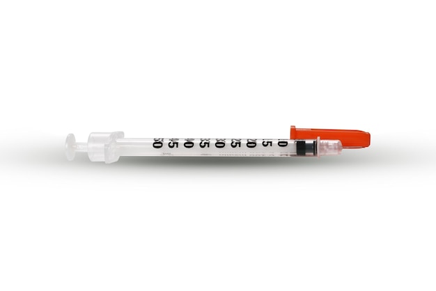 Syringe closeup isolated on white background