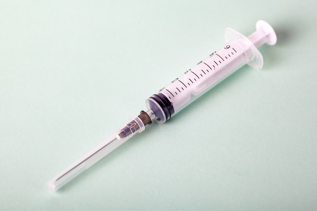 Syringe isolated on light background, medical tools, health