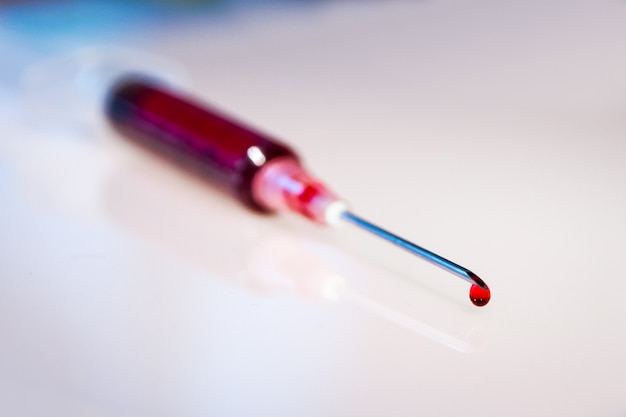 Syringe needle with blood macro view