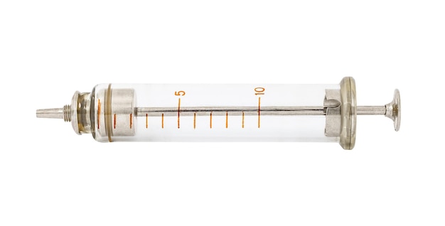 Photo syringe old glass with metal piston isolated on white background with clipping path