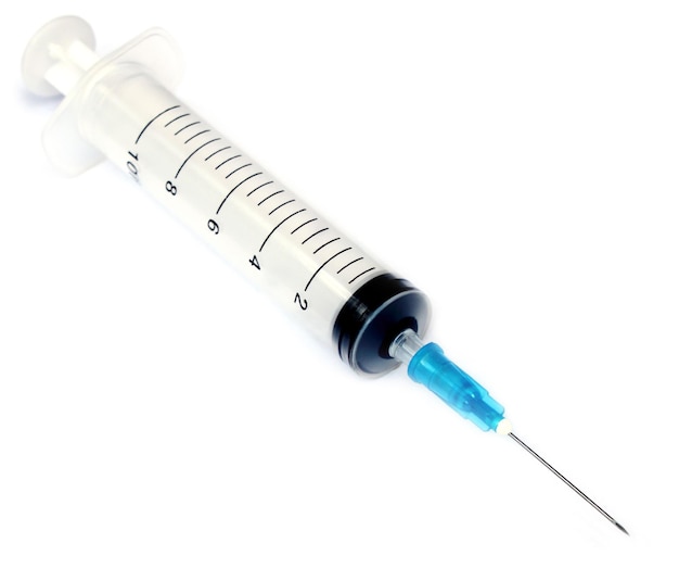 Syringe over white