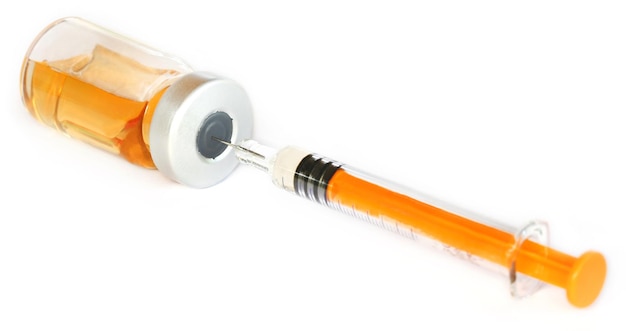 Syringe with vial over white background