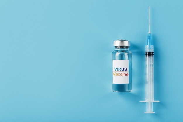 Syringes and ampoule with the vaccine against the Virus from diseases