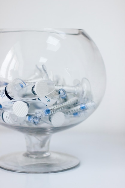 syringes in a vase glass Selective focus