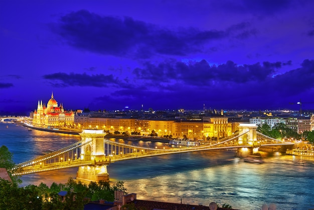 Szechenyi Chain Bridge and Parliament . Budapest, Hungary.