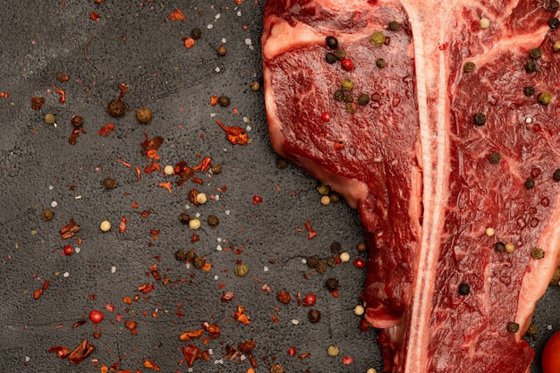 T-bone or Porterhouse on a black background.