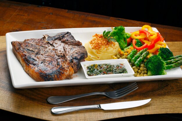 T bone steak with salad