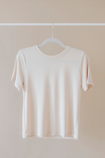 T-shirt mockup hanging on a clothing rack