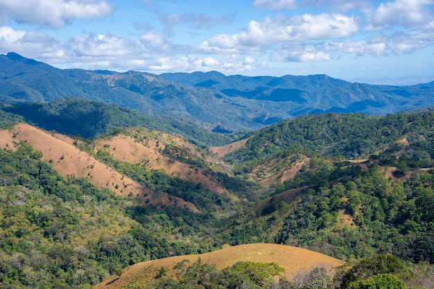 Ta Nang Phan Dung route with milestone between 3 provinces through grass hills and forests in Song Mao Nature Reserve