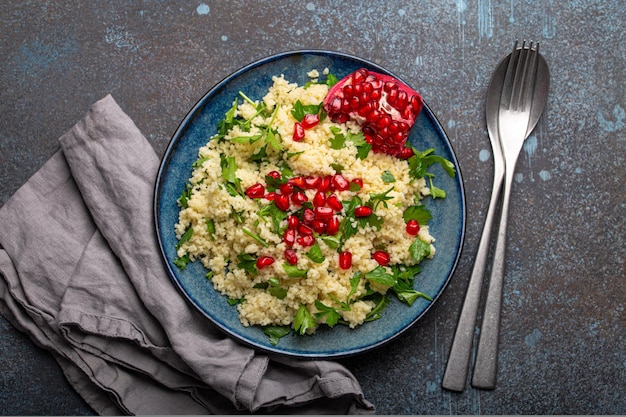 Tabbouleh salad with couscous and pomegranate