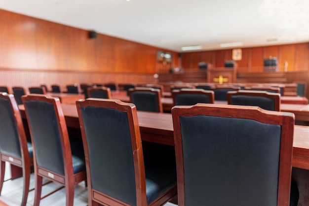 Table and chair in the courtroom of the judiciary.