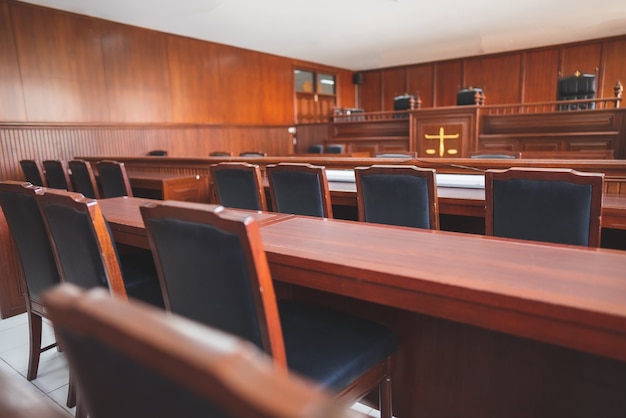 Table and chair in the courtroom of the judiciary.