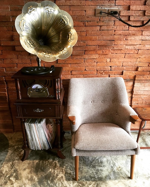 Photo table and chairs against wall at home