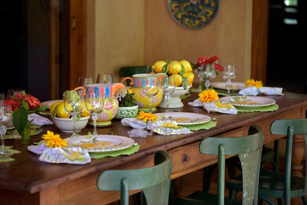 Table decorated with colorful crockery