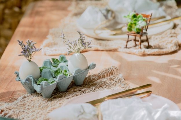 Table decorated with Easter setting to celebrate