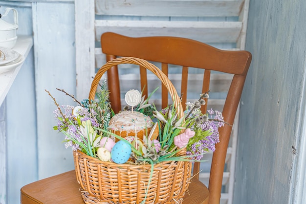 Table decoration for Easter celebration in kitchenTablescape for Easter holiday at homeFamily religious traditional festive christianitycatholic meal foodPop color eggscakefun bunnycandy sweet