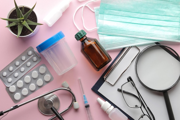 Table doctor. Medical equipment on a bright pink background. view from above. Background. Flat lay