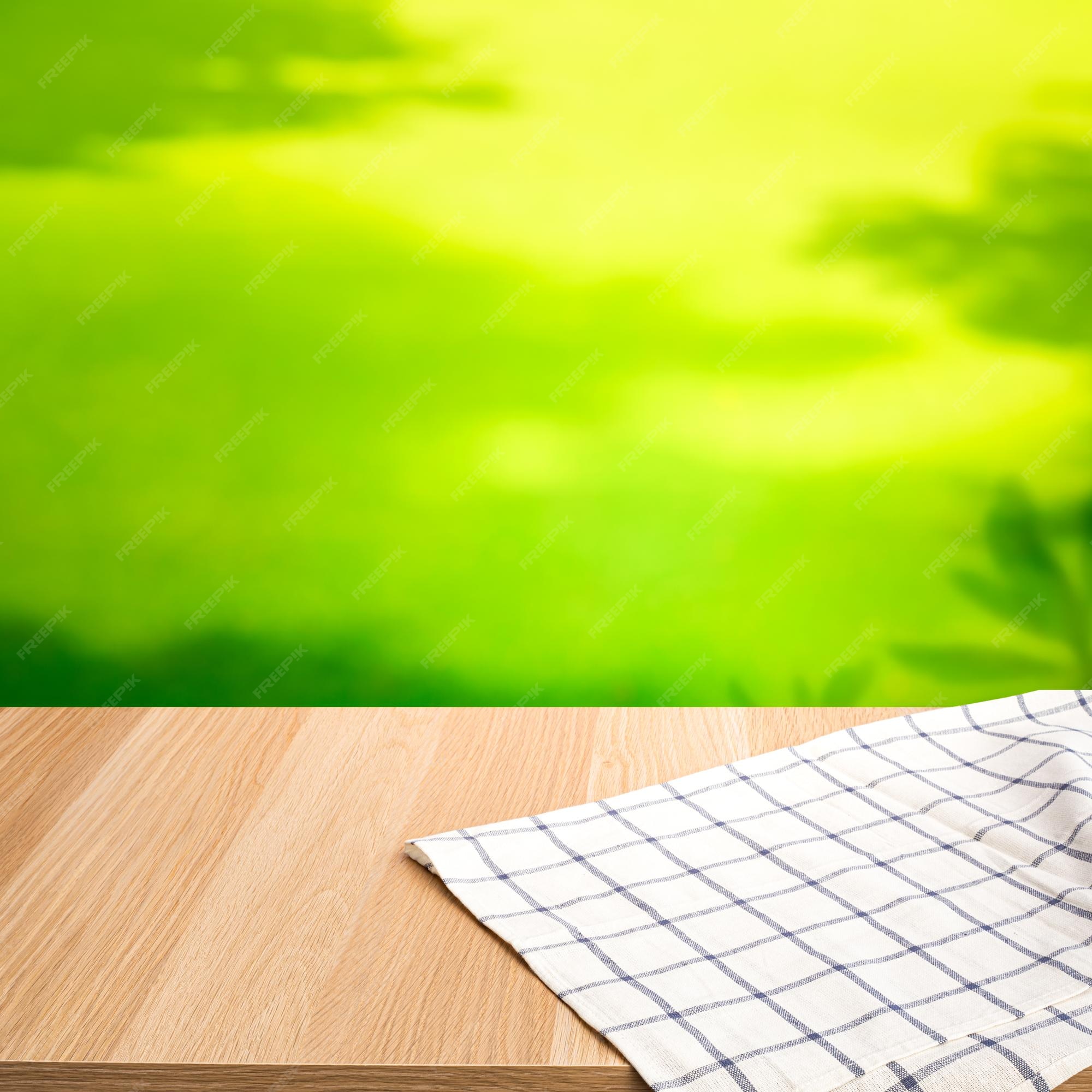 Premium Photo | Table and fabriccloth and blur green lawn backgrounddesign  for key visual food and menu