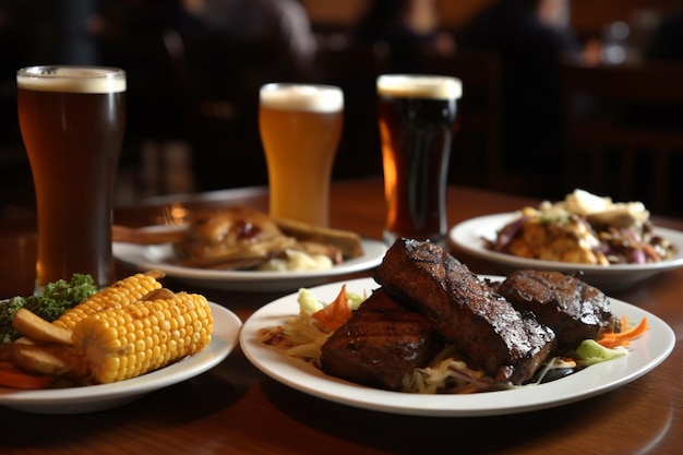 A table full of food including meat, corn, and corn on the cob