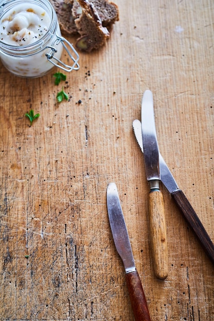 Table knives on wooden table