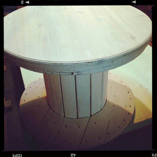 Photo table made of wooden spool