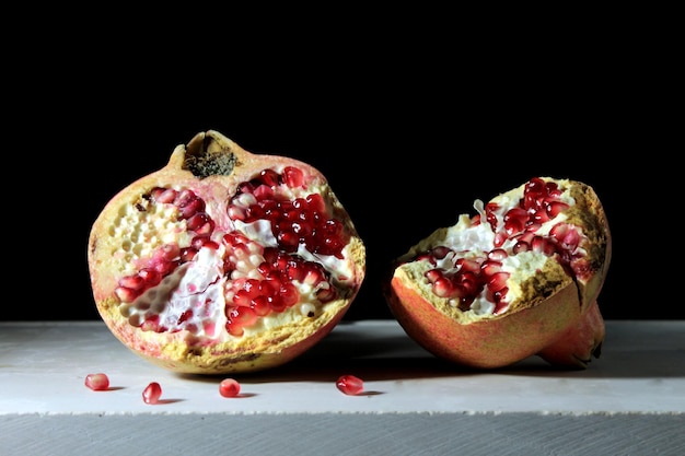 table pomegranate half closeup nutrition background