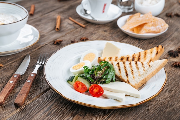 Table served with breakfast of fried eggs