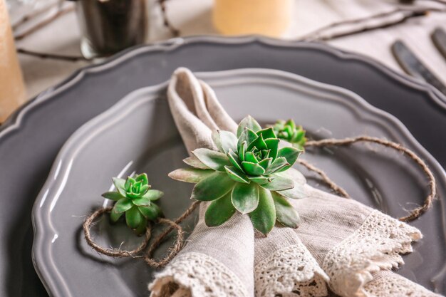 Table served with succulents on plate