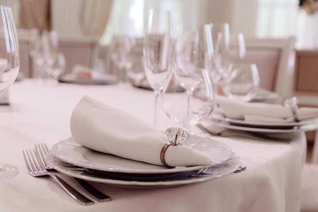 A table set for a dinner with a napkin on it