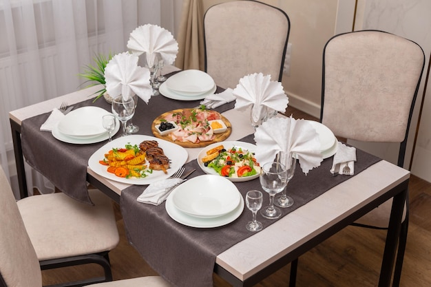 Table set up for four persons in a cafe cafeteria restaurant