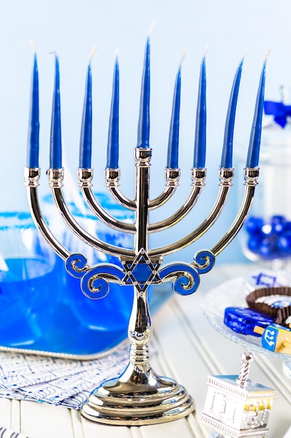 Table set with cocktails and chocolates to celebrate Hanukkah.