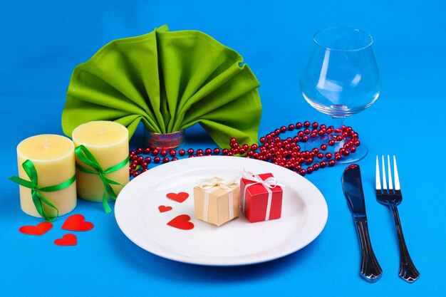 Table setting on blue background