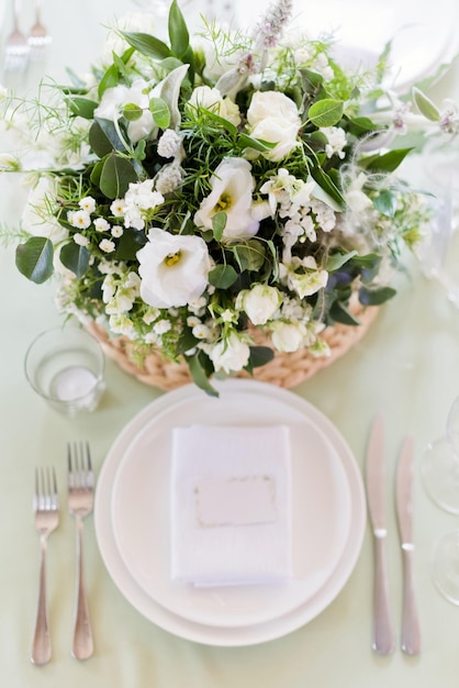 Table setting and flower composition