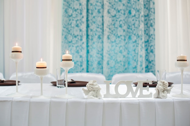 Table setting for a holiday with the letters LOVE