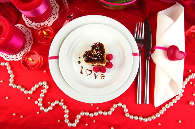 Table setting in honor of Valentine's Day close-up