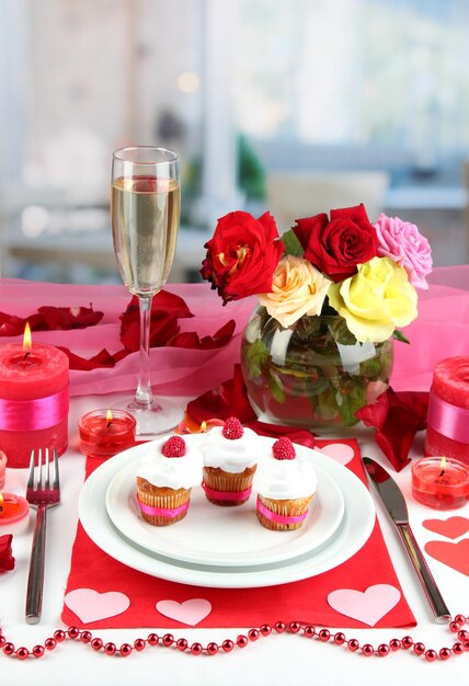 Table setting in honor of Valentine's Day on room background