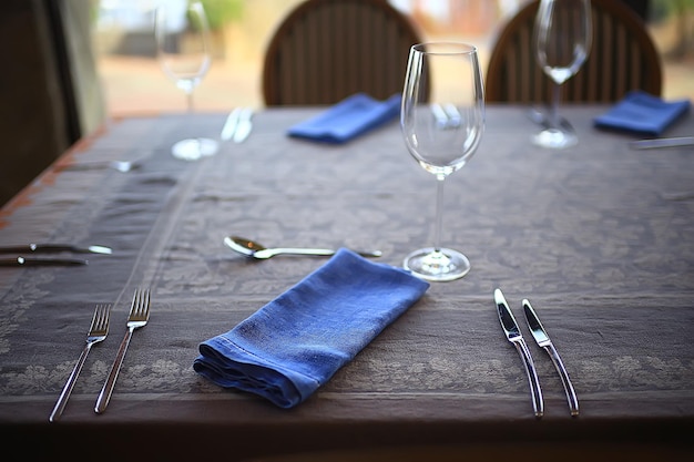 Photo table setting restaurant / cutlery on a table in a cafe, the concept of beautiful food, european style